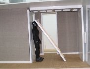 man in hotel room door hitting him